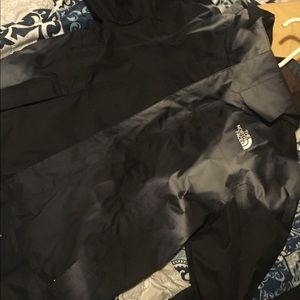 Black and grey windbreaker